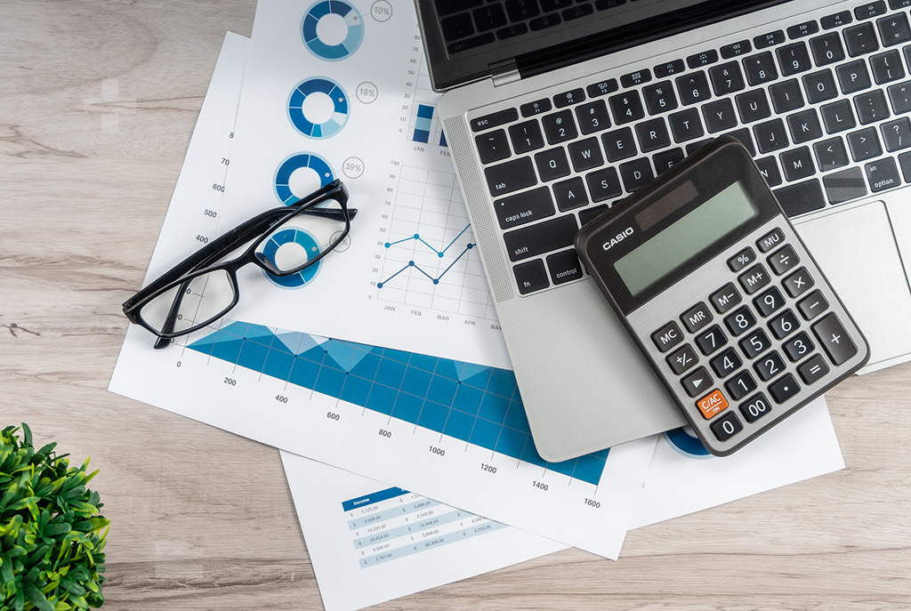 Photo depicting elements of financial operations, signifying adherence to established accounting policies and procedural guidelines